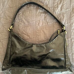 HOBO Black Leather Handbag with gold hardware.